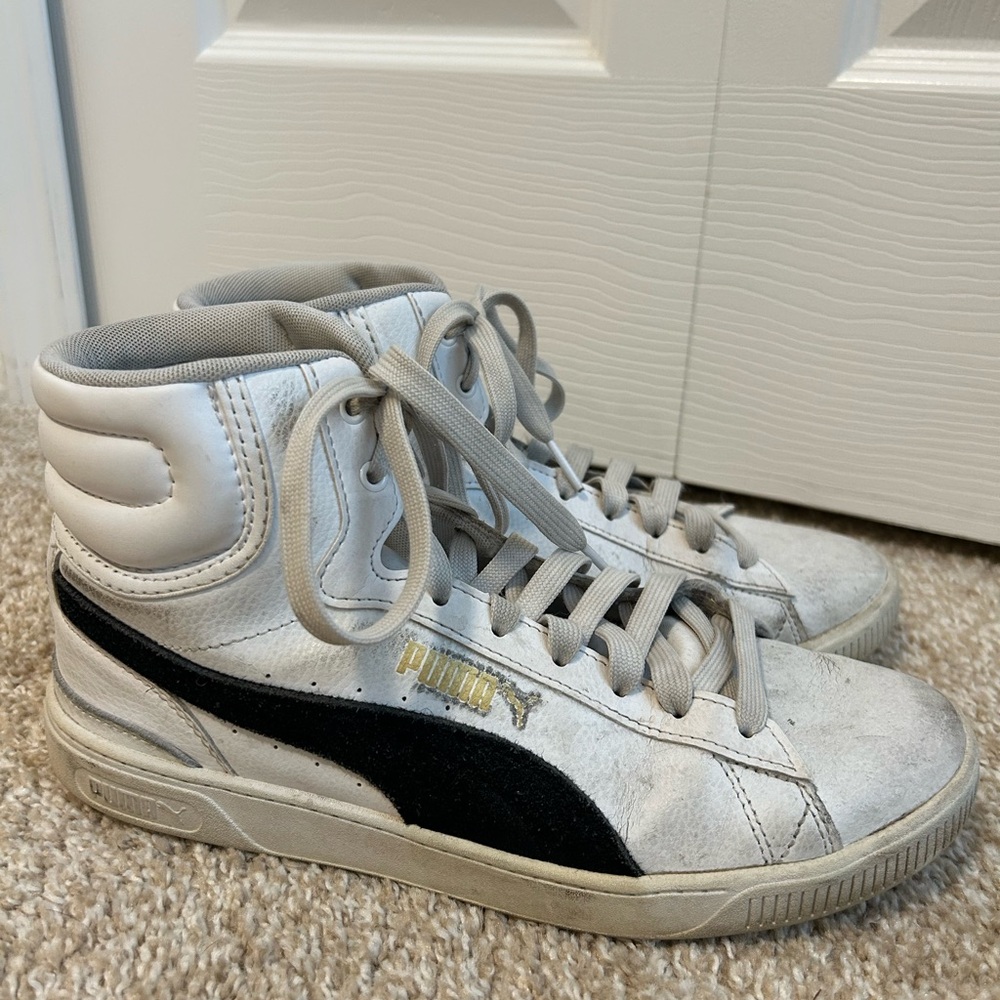 Puma women’s white and black high top sneakers